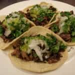 Carne Asada Tacos. Fresh Guacamole, Onions and Cilantro Mexican insurance policy