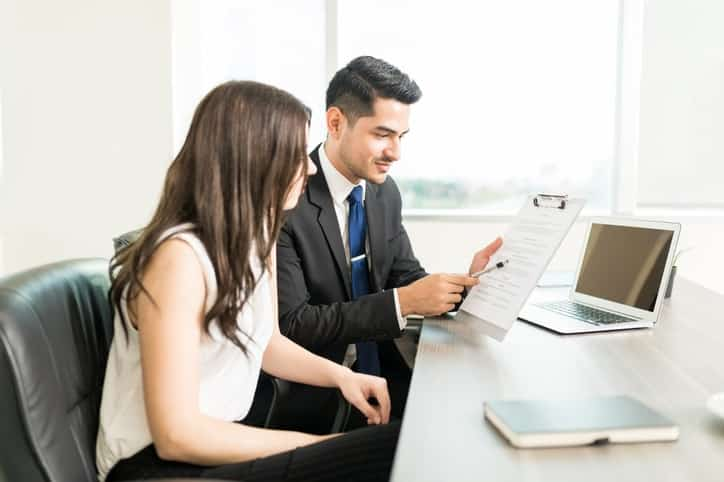 Professionals Reviewing Legal Document