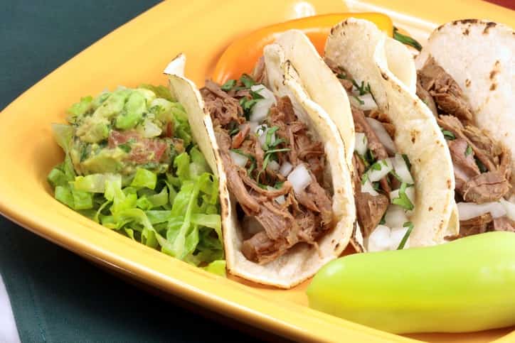 Carne Asada Tacos. Fresh Guacamole, Onions and Cilantro Mexican insurance policy