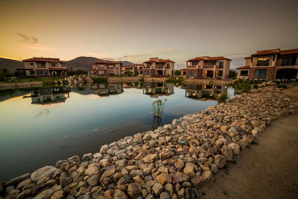 villas along pond - MexicanInsuranceStore.com